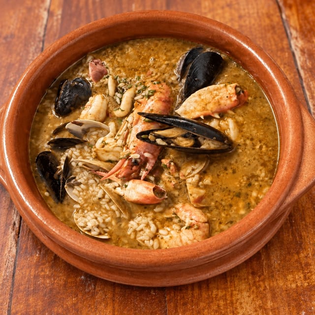 Arroz Caldoso De Mariscos.